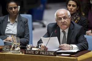 Riyad H. Mansour (centre right), Permanent Observer of the State of Palestine to the UN, addresses the Security Council, 23 December 2016. The Security Council adopted resolution 2334 (2016), reiterating its demand that Israel immediately and completely cease all settlement activities in the occupied Palestinian territory, including East Jerusalem.