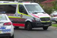 Ambulance leaving the street in Glenwood.