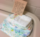 Mum, Sarah, pays it forward with bathroom nappies and wipes in case of a "pickle".