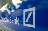 A customer enters a Deutsche Bank AG branch in Boblingen, Germany, on Monday, July 25, 2016. Deutsche Bank Chief ...