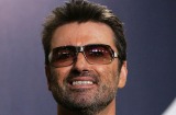 George Michael seen in a 2005 photo. He died at home, his publicist reported on Monday (AEDT).