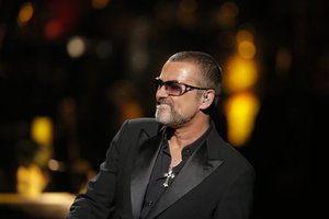 British singer George Michael performs at a concert to raise money for AIDS charity Sidaction, during the Symphonica tour at Palais Garnier Opera house in Paris, France, Sunday, Sept. 9, 2012.