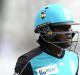 BRISBANE, AUSTRALIA - DECEMBER 26: Deandra Dottin of the Heat looks dejected after losing her wicket during the WBBL ...