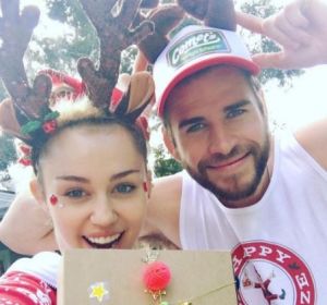 Miley Cyrus and Liam Hemsworth have really shown their love for each other and the festive season with ugly sweater, an ...