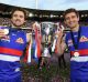 Success story: Joel Hamling (left) with Fletcher Roberts after the Bulldogs' 2016 grand final victory.