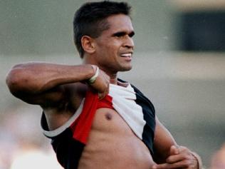 18/04/1993. Nicky Winmar lifts his jumper and points to the colour of his skin to the Collingwood supporters at Victoria Park. He had been racially abused by the Collingwood crowd for being an aboriginal. The Saints won the match. St Kilda v Collingwood. 1993. ** NEGATIVE MISSING ** Picture: John Feder