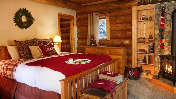 Each bedroom has a fireplace, mountain views and decor following a strict red, green and white colour scheme.