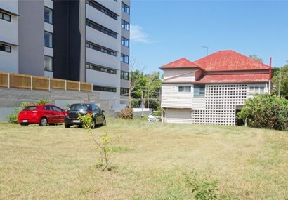 100-year-old home wedged between unit blocks for sale 