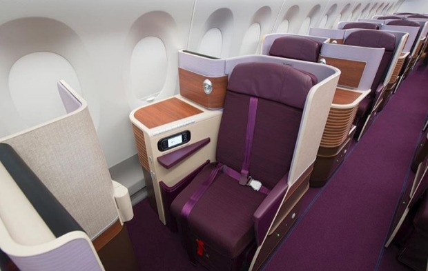 Thai Airways business class on board the Airbus A350. Thai's first A350 XWB jetliner has 321 seats configured in a ...