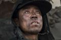 A Chinese labourer works at an unauthorised steel factory in Inner Mongolia, China.  Pollution levels in neighbouring ...