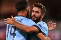 Front-runners: Skipper Alex Brosque (left) and Michael Zullo have been key figures in a clinical Sydney FC side this season.