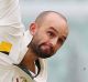 MELBOURNE, AUSTRALIA - DECEMBER 28: Nathan Lyon of Australia bowls during day three of the Second Test match between ...