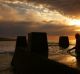 A man enters the water at the baths at Coogee Beach earlier this week.