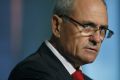 NAB chairman Ken Henry says the bank is closing the gap on rivals after a disappointing share price performance in ...