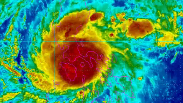 Typhoon Nock-ten as it moves across the Philippines on early Boxing Day.