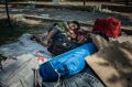 A child sleeps in a public park in Akcakale, Turkey, where some Syrian refugees have been staying.