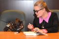 Carrie Fisher (R) and her dog Gary Fisher (L) sign copies of her new book 'The Princess Diarist'  in Los Angeles, ...