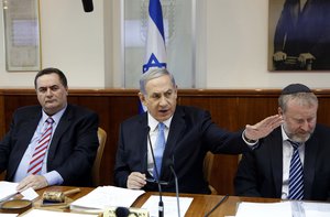 Israeli Prime Minister Benjamin Netanyahu chairs the weekly Cabinet meeting