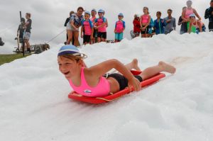 News. Elouera Surf Club nippers Christmas carnival. They have turned 20 tons of ice into snow so the kids can toboggan ...