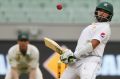 On song: Azhar Ali evades a bouncer during day two.