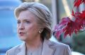 Hillary Clinton and her husband former president Bill Clinton talk after voting in Chappaqua, New York, on election day.