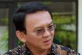 Jakarta Governor Basuki Tjahaja Purnama, popularly known as Ahok (centre), faces five years in prison if found guilty of ...