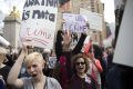 Demonstators at  rally in New York on Thursday protest against Republican presidential candidate Donald Trump's remarks ...