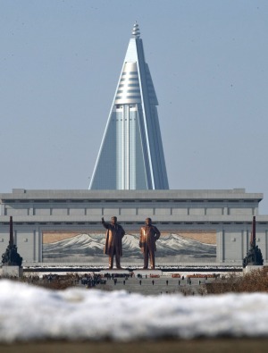 Statues of late leaders Kim Il Sung, left, and Kim Jong Il, right, at Mansu Hill near the Ryugyong Hotel.