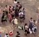 Police and bystanders at Mermaid Pools in Tahmoor on Friday afternoon.