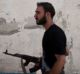 A Free Syrian Army soldier walks through a street in Amariya district in Aleppo in September. The rebels have now ...
