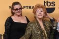 Carrie Fisher, left, and Debbie Reynolds at the 21st Annual Screen Actors Guild Awards in 2015.