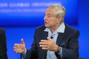 File - George Soros, Chairman of Soros Fund Management, talks during a television interview for CNN, Sunday, Sept. 27, 2015 at the Clinton Global Initiative in New York.