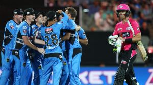 ADELAIDE, AUSTRALIA - DECEMBER 31: Johan Botha of the Sydney Sixers leaves the field after getting out to Ben Laughlin ...