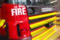 A man suffered burns while attempting to put out a fire.