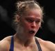 LAS VEGAS, NV - DECEMBER 30: (L-R) Ronda Rousey and Amanda Nunes of Brazil face off in their UFC women's bantamweight ...