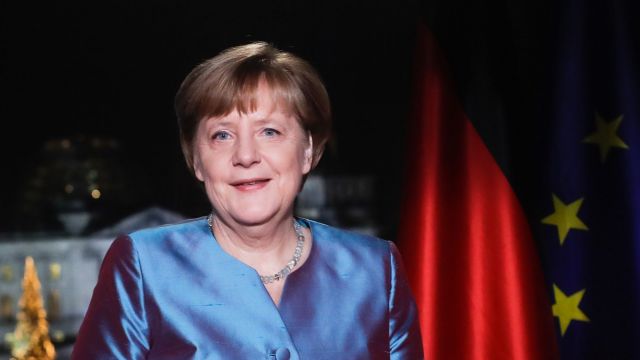 German Chancellor Angela Merkel poses for photographs after the television recording of her annual New Year's speech at ...