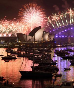 Sydney NYE 2016. The 12am New Year's Eve fireworks on Sydney Harbour, viewed from Mrs Macquarie's Chair. 1 January 2017. ...