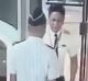 The video shows the pilot staggering through security at Surabaya airport.