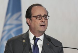 France's President Francois Hollande speaks during the opening session of the U.N. climate conference in Marrakech, Morocco, Tuesday, Nov. 15, 2016.