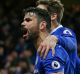 LONDON, ENGLAND - DECEMBER 31: Diego Costa of Chelsea celebrates scoring his team's fourth goal during the Premier ...