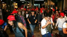 Crowds race inside the David Jones city store in the early hours of the morning on Boxing Day, 2015.