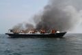The Zahro Express ablaze at sea about 20 minutes after leaving port in Jakarta on New Year's Day. 
