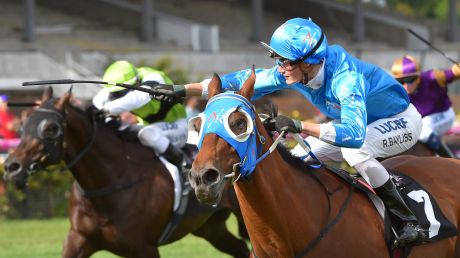 Jockey Regan Bayliss salutes on Annus Mirabilis after winning the Bagot Handicap.