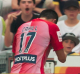 Shadow boxing: Tim Cahill pushes on gamely with his fighting routine after the Gosford ball boy removed the corner post.