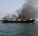 The Zahro Express ablaze at sea about 20 minutes after leaving port in Jakarta on New Year's Day. 