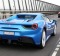 The 488 Spider roars over the West Gate Bridge.