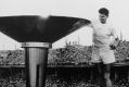  Australian Olympian Rob Clarke lights the Olympic Torch at the opening ceremony of the 17th Olympic Games held in ...