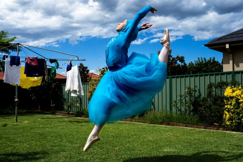 Ballerina Stephanie Kurlow, 14, practicing ballet in her backyard.