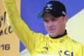 MEGEVE, FRANCE - JULY 23:  Chris Froome of Great Britain and Team Sky celebrates as he retains the Yellow Jersey ...