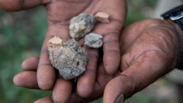 Jida Murray Gulpilil near the banks of Lake Boort with some clay balls which were used in cooking like heat beads are today.